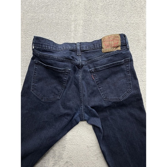 Levis 502 Performance Jeans Mens Dark Wash Blue Straight Stretch Measured 34x27 - Picture 9 of 10